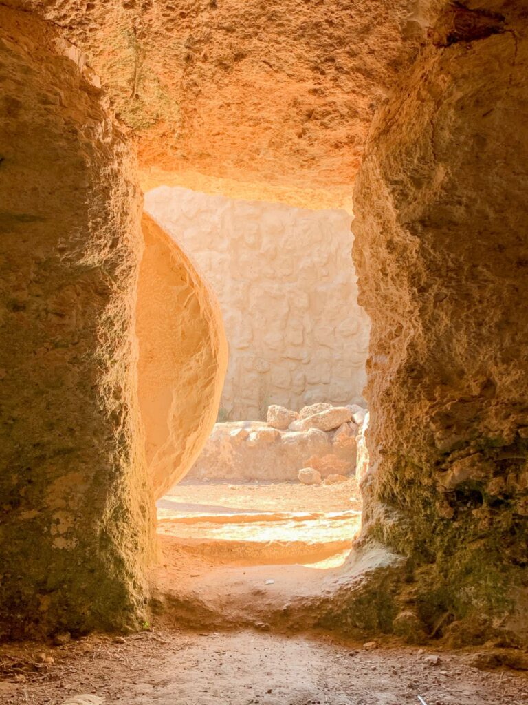 empty tomb with stone rolled back