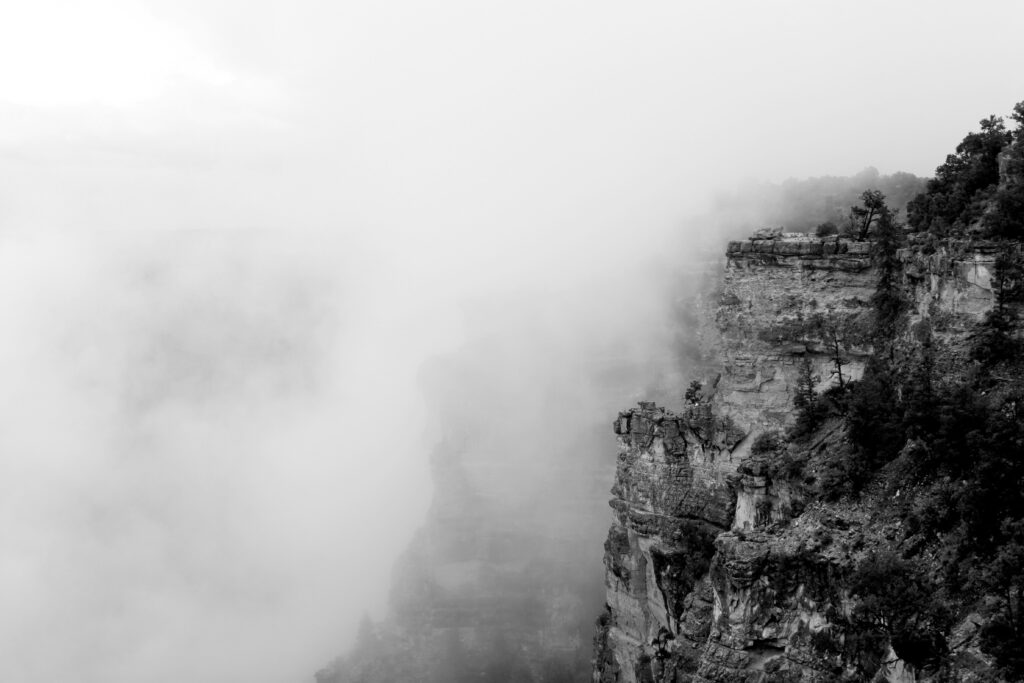 canyon walls obscured by clouds