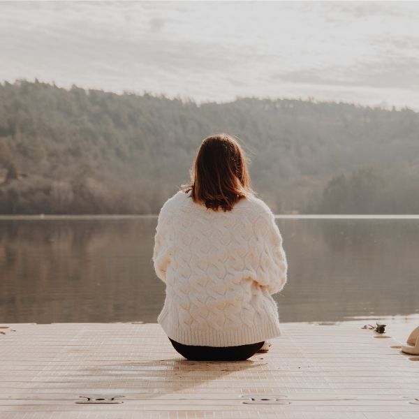 woman alone on a dock